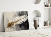 Single-feather painterly glass wall art over linen sofa in designer lounge