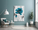 Teal-and-charcoal botanical glass wall art over master-bedroom headboard