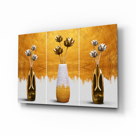 Gold tulip vases triptych cinematic glass wall art above ivory boucle sofa