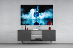 Smoke-and-cobalt cocktail glass wall art in tasting-room interior