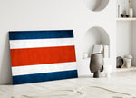 Weathered-flag cinematic glass wall art in heritage stairwell