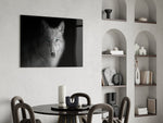 Black-and-white wolf cinematic glass wall art over modern dining sideboard