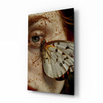 Freckled eye butterfly wing cinematic glass wall art over walnut console in designer fashion atelier