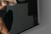 Goddess archetype cinematic glass wall art in wellness clinic