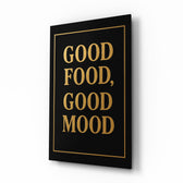 Good Food Good Mood gold cinematic glass wall art over walnut console in designer kitchen