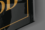 Gold-on-black typography cinematic glass wall art in wine-cellar tasting room