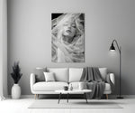 Helmut-Newton style cinematic glass wall art in heritage stairwell