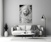 Helmut-Newton style cinematic glass wall art in heritage stairwell