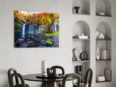Autumn-foliage waterfall cinematic glass wall art over modern dining sideboard