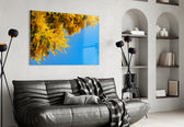 Cobalt-and-yellow bloom cinematic glass wall art in heritage living room