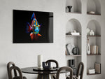 Cobalt-and-tangerine fish cinematic glass wall art over modern dining sideboard
