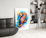 Tangerine-and-cobalt seahorse cinematic glass wall art over modern dining sideboard
