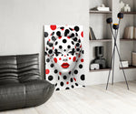 Red-and-black dots cinematic glass wall art over modern dining sideboard