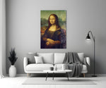 Mona Lisa glass wall art styled above a console in a designer interior