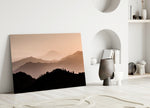 Mountains glass wall art styled above a bed in a bedroom