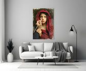 Portrait glass wall art styled above a console in a study