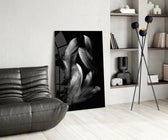 Feather glass print enhancing a meditation corner with quiet drama