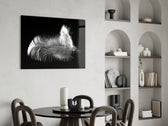 Feather glass print enhancing a meditation corner with quiet drama