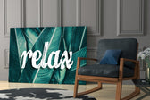 Relax artwork anchoring a wall with serene botanical palette