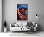 Road glass wall art styled above a desk in a man's office