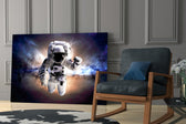 Astronaut artwork anchoring a wall with bold futurist palette