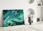 Ocean glass wall art styled above a sofa in a living room