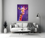 Giraffe glass wall art styled above a bed in a child's room