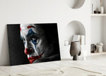 Joker Sketch glass wall art styled above a desk in a man's office