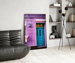 Blue Door glass print enhancing a guest room with editorial drama