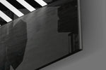 Triangle panel catching low light to reveal its tactile precision
