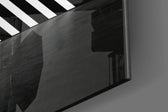 Triangle panel catching low light to reveal its tactile precision