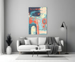 Memphis glass wall art styled above a desk in a creative office