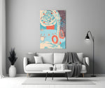 Doodle glass wall art styled above a rocking chair in a nursery