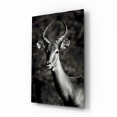 Monochrome-portrait panel bringing naturalist drama to a contemporary living space