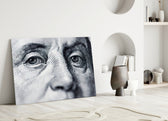 Franklin glass wall art styled above a desk in a man's office