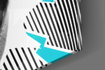 Scream panel catching gallery light to reveal its tactile precision