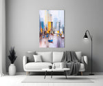 Harbor City glass wall art styled above a sofa in a living room
