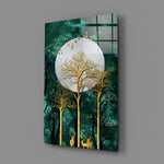 Close-up detail of golden deer silhouettes among silvered branches