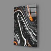 Close-up detail of silver-and-amber waves curling through black