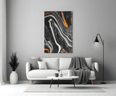 Black Wave glass wall art styled above a desk in a man's office