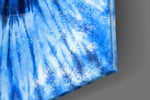 Blue Tie Dye panel catching gallery light to reveal its tactile bleed