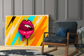 Pop Lips artwork anchoring a wall with bold kinetic palette