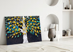 Jewel Tree glass wall art styled above a sofa in a living room