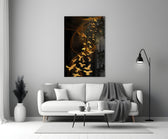 Gold Flight glass wall art styled above a console in a foyer
