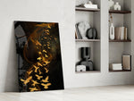 Gold Flight artwork anchoring a wall with moody luxe palette
