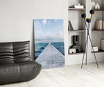 Pier Horizon glass print enhancing a guest room with editorial spirit