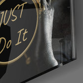 Just Do It panel catching low light to reveal its tactile precision