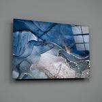 Close-up detail of sapphire cloud pooling into ivory-blush stone