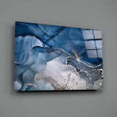 Close-up detail of sapphire cloud pooling into ivory-blush stone
