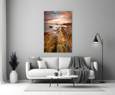 Golden Coast glass wall art styled above a sofa in a living room